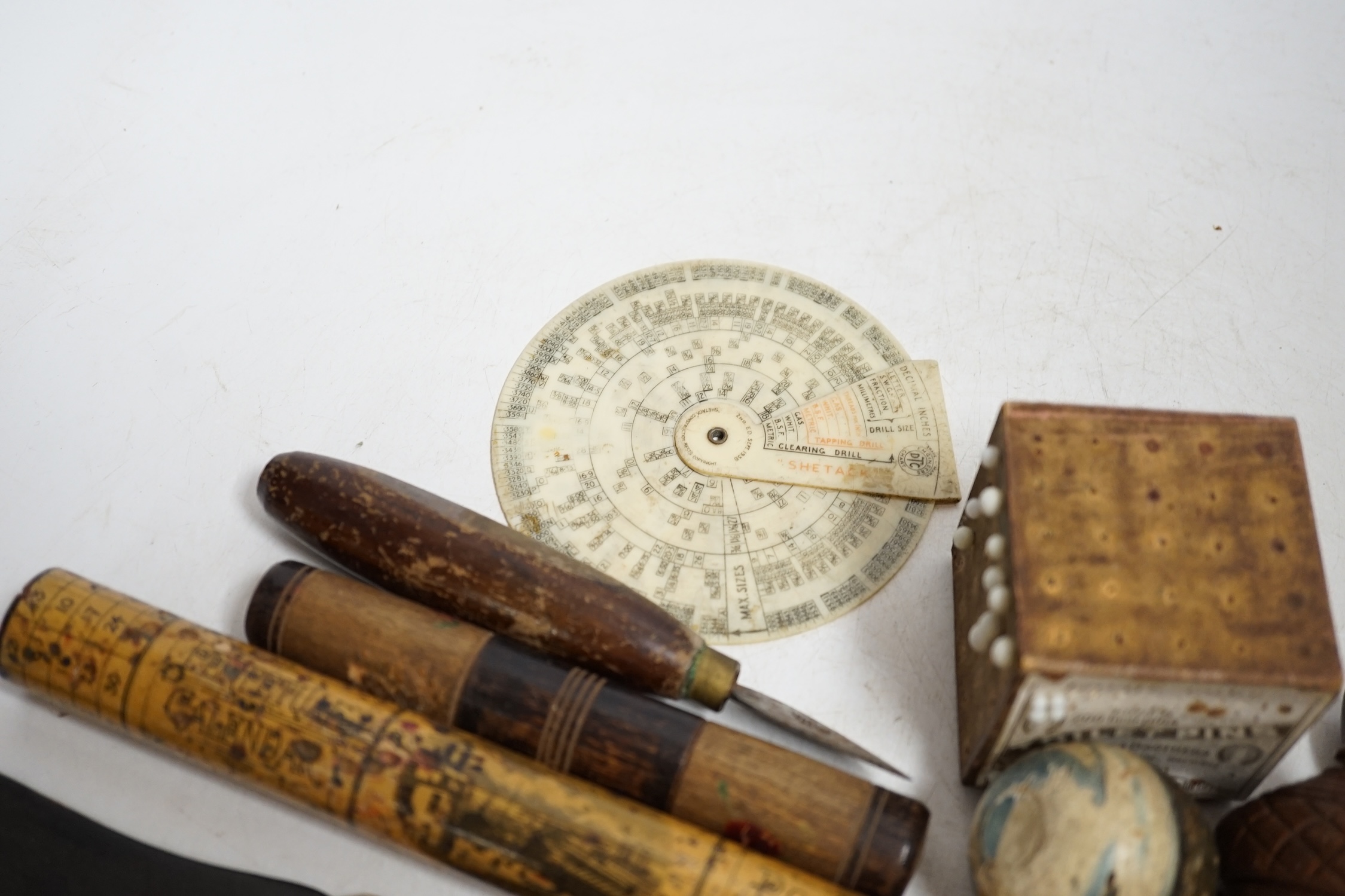 A collection of treen and sundry items to include bone crochet hooks, sewing items, a treen cricket bat shaped letter opener, etc. Condition - varies, poor to fair
